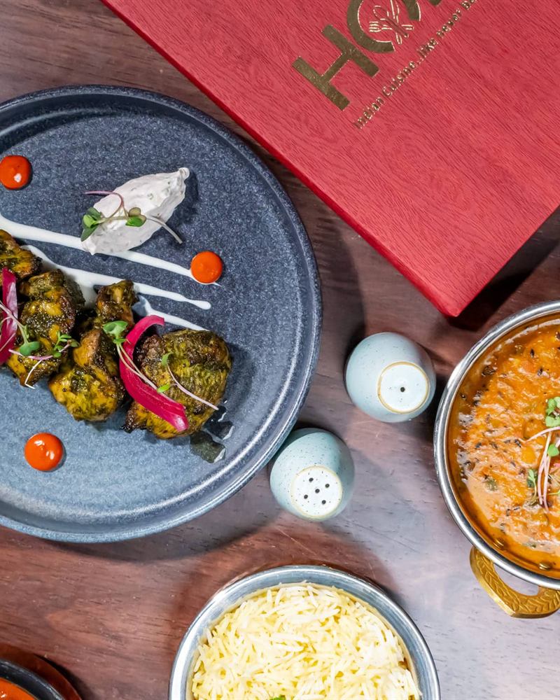 A table laid for dinner at Holi